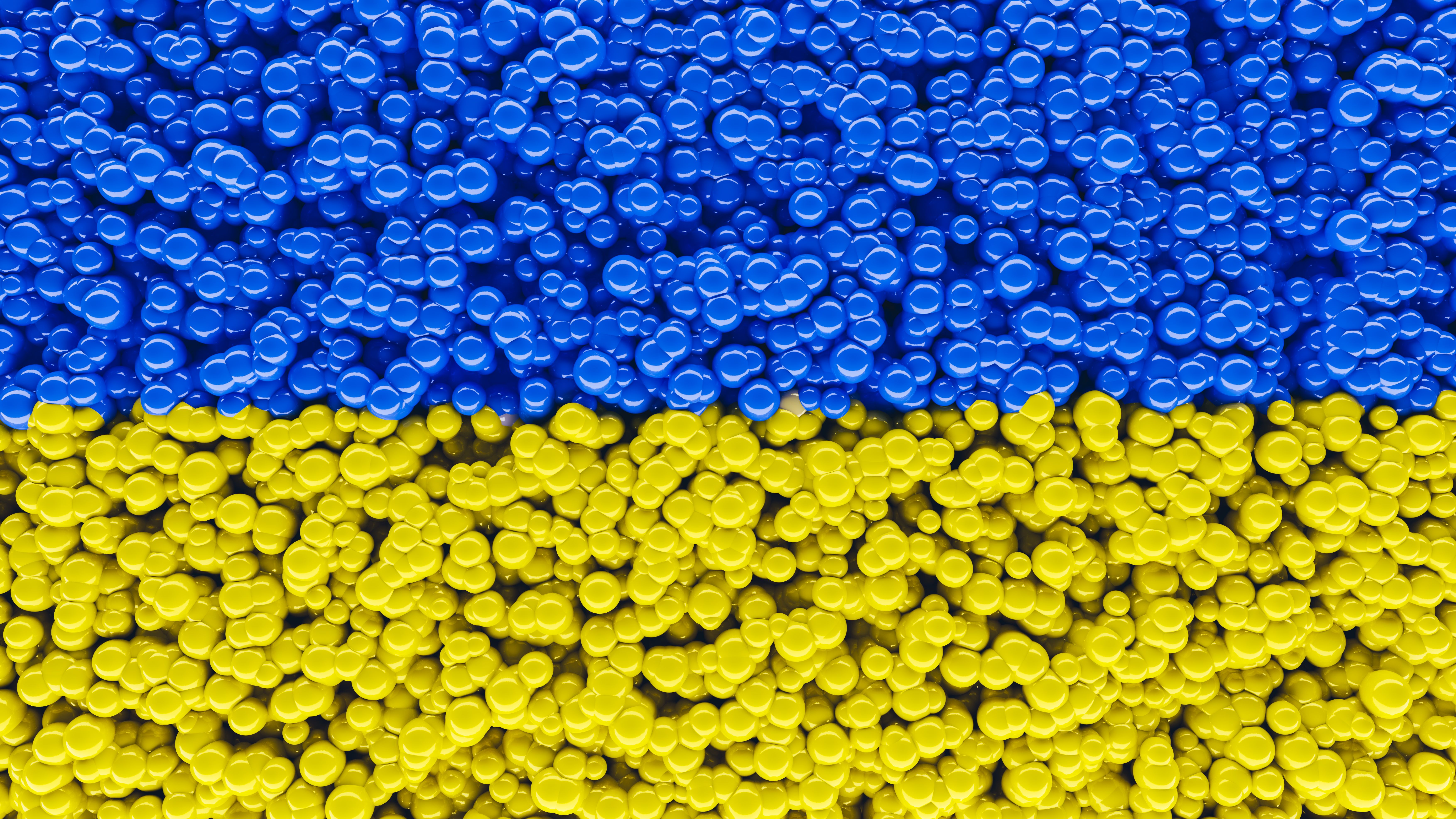 A vibrant abstract pattern in blue and yellow resembling the Ukrainian flag.